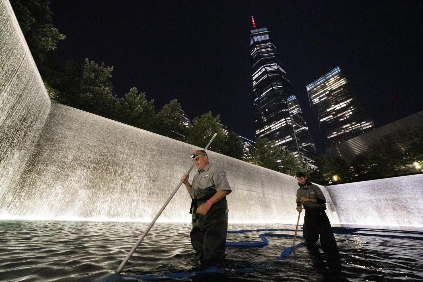 Ground zero: A selfie stop for some, a cemetery for others | AP News